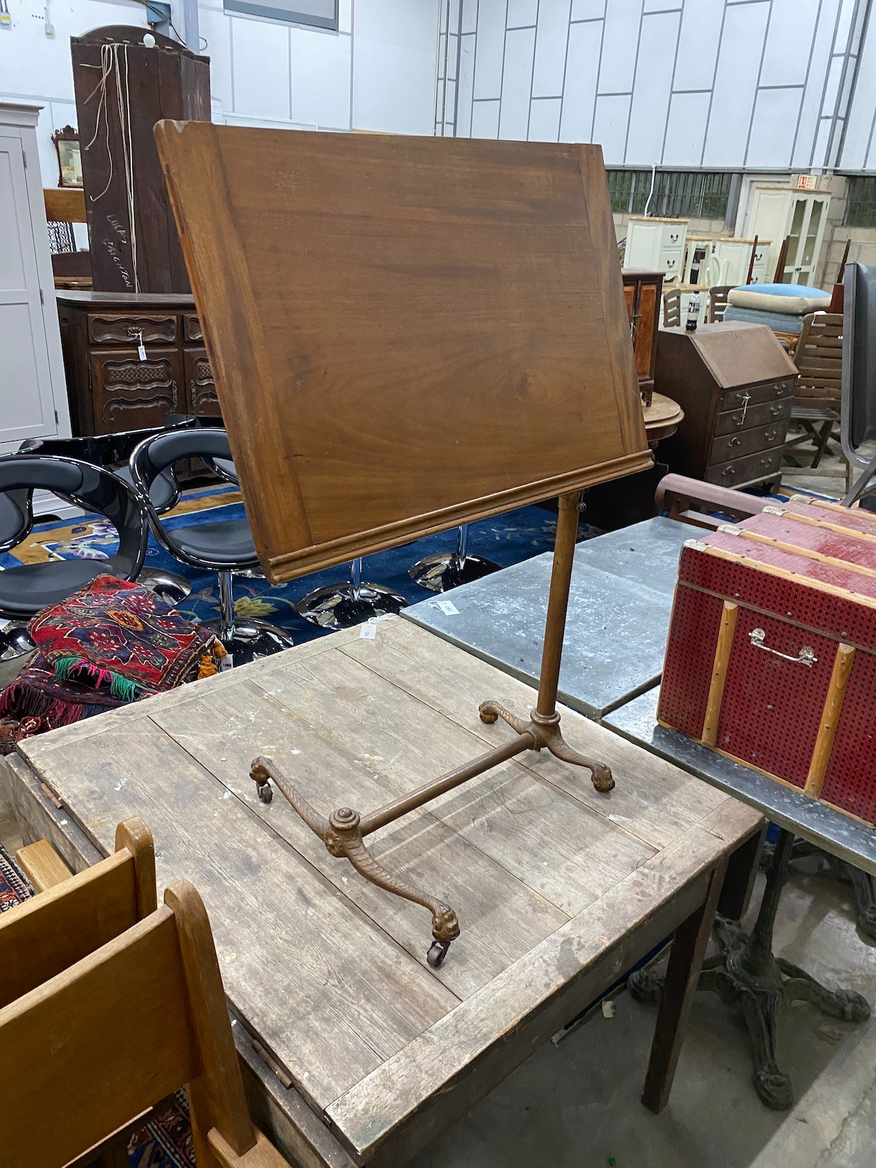 An Edwardian mahogany and cast iron invalid's table, width 68cm